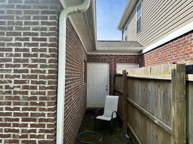 914 Baden Manor Dr, Indianapolis, IN 46217 - view of property exterior featuring brick siding and a shingled roof