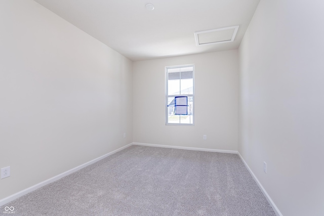 2741 Penn Ave, Plainfield, IN 46168 - empty room featuring carpet floors and attic access