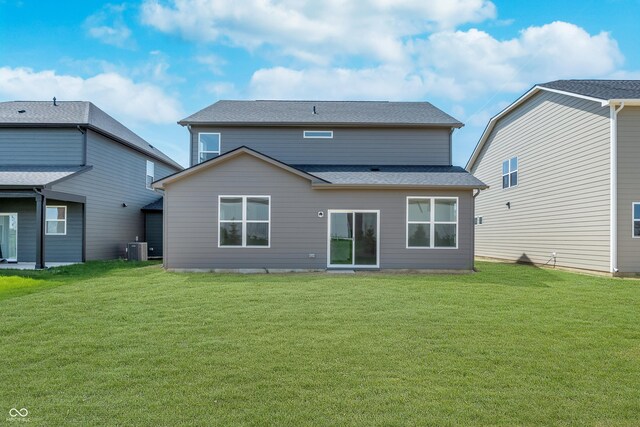 2741 Penn Ave, Plainfield, IN 46168 - back of house featuring a lawn and roof with shingles