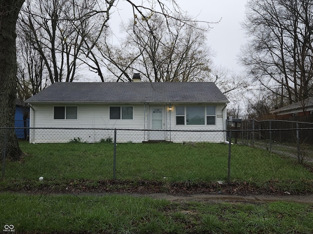 1931 Brentwood Dr, Anderson, IN 46011 - ranch-style home featuring a chimney, a front lawn, and a fenced front yard