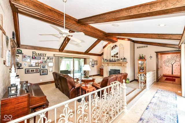 1153 Diablo Rd, Greenwood, IN 46143 - living area with ceiling fan, a fireplace, lofted ceiling with beams, visible vents, and baseboards