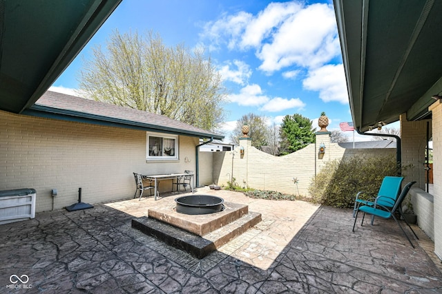 1153 Diablo Rd, Greenwood, IN 46143 - view of patio / terrace featuring an outdoor fire pit and fence