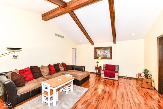 1153 Diablo Rd, Greenwood, IN 46143 - living area with visible vents, wood finished floors, and lofted ceiling with beams