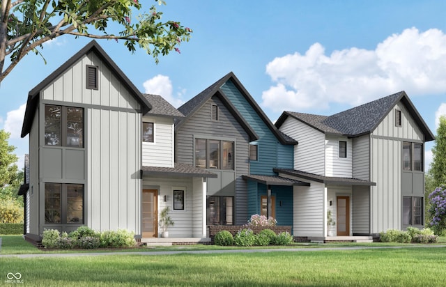 16375 Burlwood Dr, Westfield, IN 46074 - view of front facade with board and batten siding, a shingled roof, and a front yard