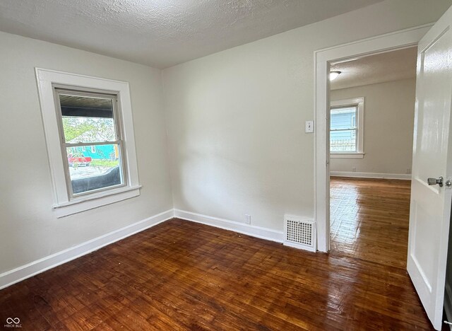 1032 Groff Ave, Indianapolis, IN 46222 - empty room featuring wood finished floors and baseboards