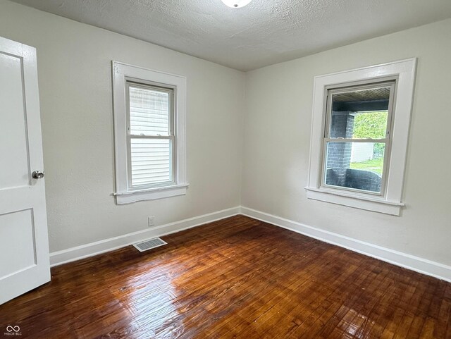 1032 Groff Ave, Indianapolis, IN 46222 - unfurnished room with wood finished floors and baseboards