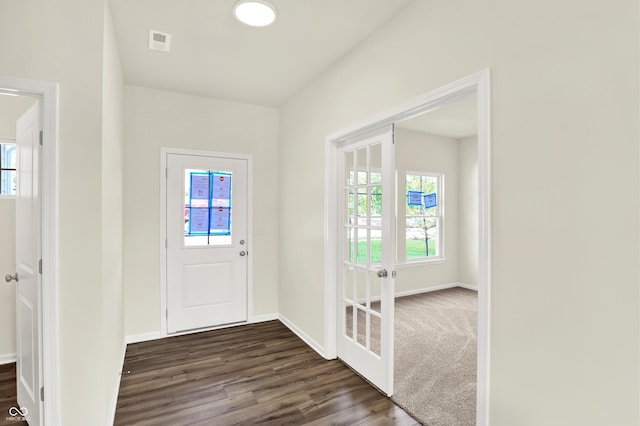 3727 Thomas Jefferson Ct, Westfield, IN 46074 - entrance foyer with healthy amount of natural light, dark wood finished floors, and baseboards