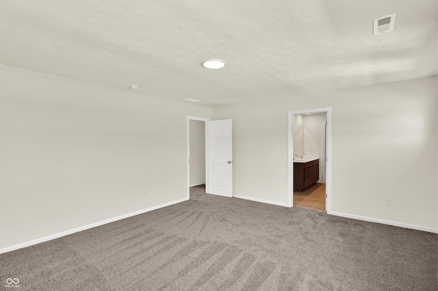 3727 Thomas Jefferson Ct, Westfield, IN 46074 - spare room featuring carpet floors, baseboards, and a textured ceiling