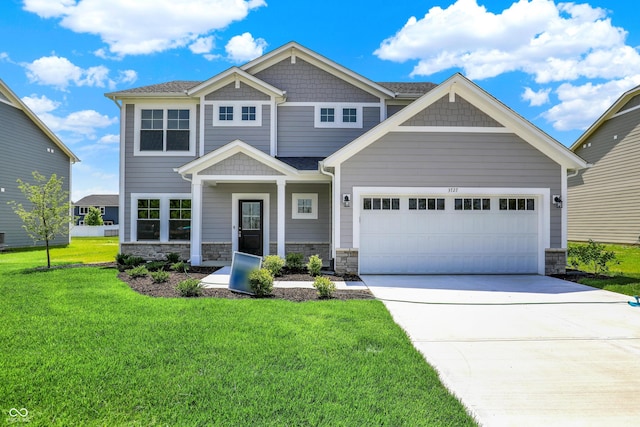 3727 Thomas Jefferson Ct, Westfield, IN 46074 - craftsman inspired home with driveway, stone siding, a front lawn, and an attached garage