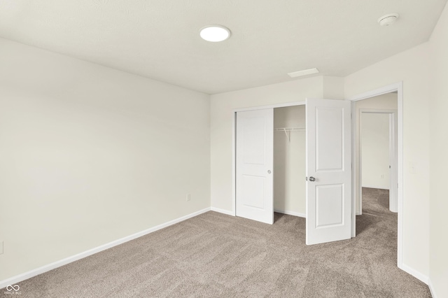 3727 Thomas Jefferson Ct, Westfield, IN 46074 - unfurnished bedroom with carpet flooring, a closet, and baseboards