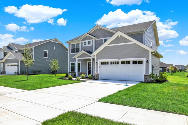 3727 Thomas Jefferson Ct, Westfield, IN 46074 - craftsman-style home with driveway, a front yard, and stone siding