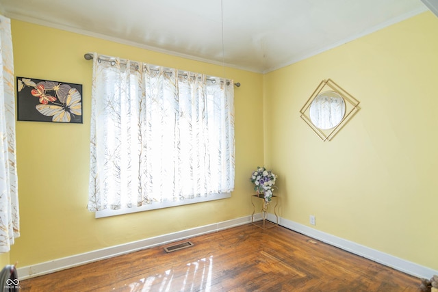 504 S Lebanon St, Lebanon, IN 46052 - spare room featuring visible vents, baseboards, and ornamental molding