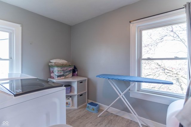 504 S Lebanon St, Lebanon, IN 46052 - laundry room featuring laundry area, light wood finished floors, plenty of natural light, and washer / dryer