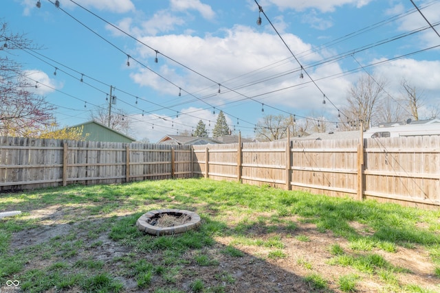 504 S Lebanon St, Lebanon, IN 46052 - view of yard featuring a fire pit and fence