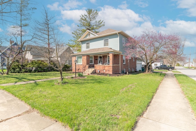 504 S Lebanon St, Lebanon, IN 46052 - view of front facade with a shingled roof, brick siding, and a front lawn