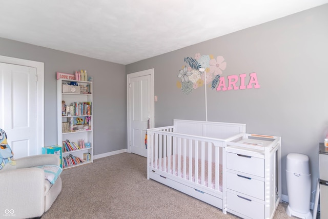 504 S Lebanon St, Lebanon, IN 46052 - carpeted bedroom featuring baseboards and a nursery area