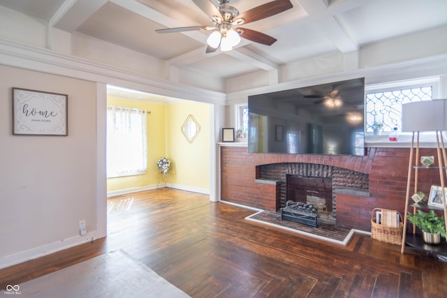 504 S Lebanon St, Lebanon, IN 46052 - living area featuring baseboards, a ceiling fan, coffered ceiling, and a brick fireplace