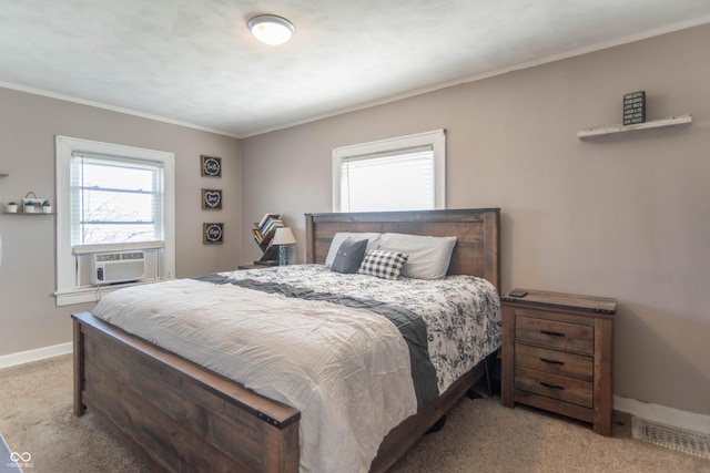504 S Lebanon St, Lebanon, IN 46052 - carpeted bedroom with cooling unit, baseboards, and crown molding