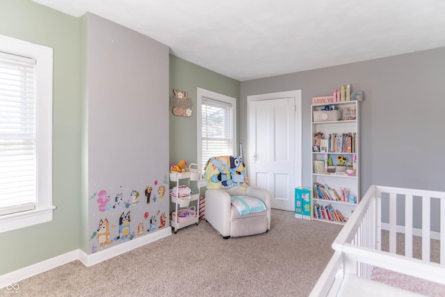 504 S Lebanon St, Lebanon, IN 46052 - bedroom featuring a nursery area, carpet floors, baseboards, and a closet