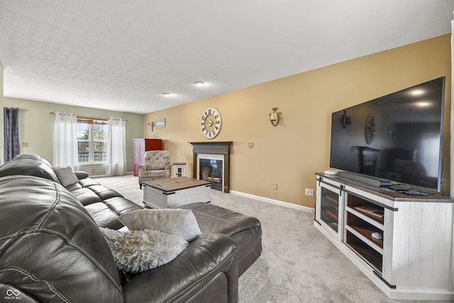 living area with light colored carpet and baseboards