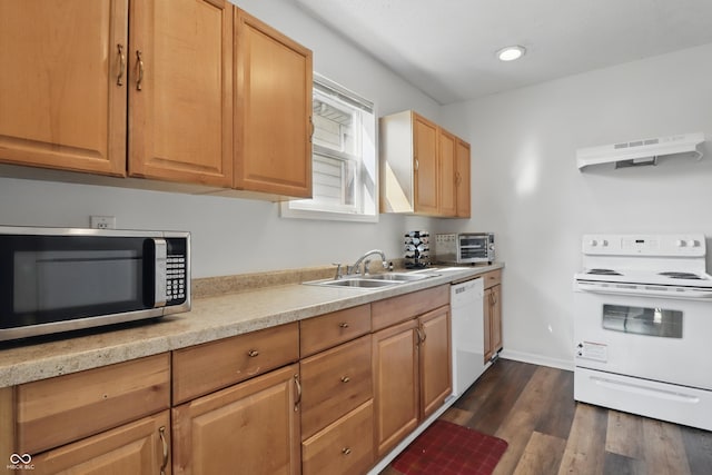 443 N Alton Ave, Indianapolis, IN 46222 - kitchen with white appliances, a sink, under cabinet range hood, dark wood-style flooring, and light countertops
