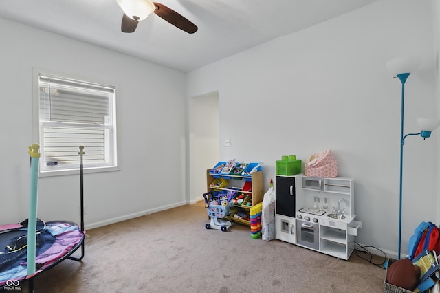 443 N Alton Ave, Indianapolis, IN 46222 - playroom featuring carpet, a ceiling fan, and baseboards