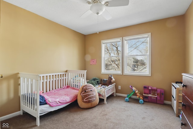 443 N Alton Ave, Indianapolis, IN 46222 - bedroom with carpet floors, baseboards, and a ceiling fan
