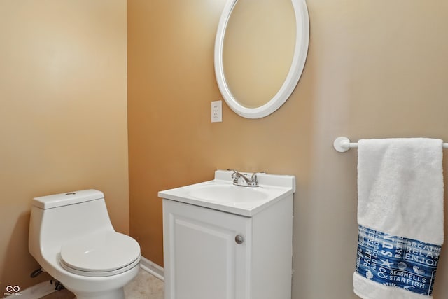 443 N Alton Ave, Indianapolis, IN 46222 - bathroom with vanity, toilet, and tile patterned floors