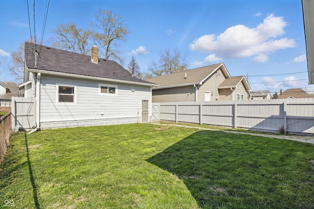 443 N Alton Ave, Indianapolis, IN 46222 - rear view of house featuring a chimney and a shingled roof