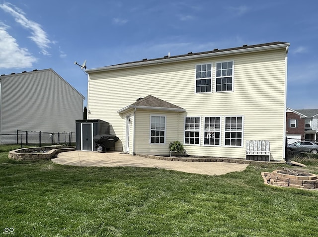 9873 Blue Ridge Way, Indianapolis, IN 46234 - back of property with an outdoor fire pit and a patio area