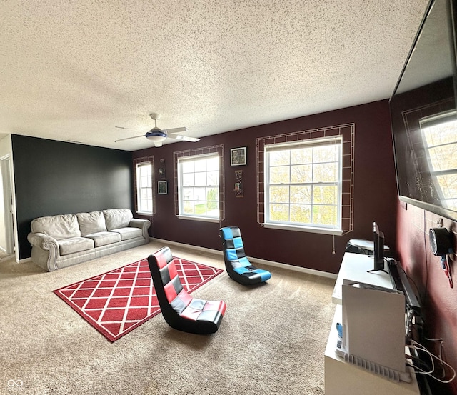 9873 Blue Ridge Way, Indianapolis, IN 46234 - carpeted living room with a textured ceiling, a ceiling fan, and baseboards