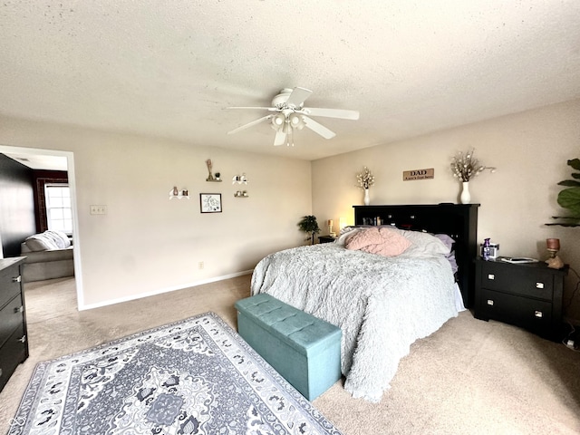 9873 Blue Ridge Way, Indianapolis, IN 46234 - bedroom with light carpet, a textured ceiling, and a ceiling fan