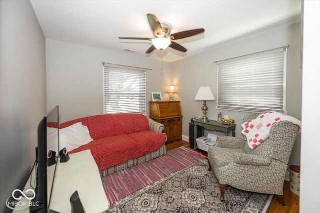 19702 Tomlinson Rd, Westfield, IN 46074 - living area featuring wood finished floors, ceiling fan, and visible vents