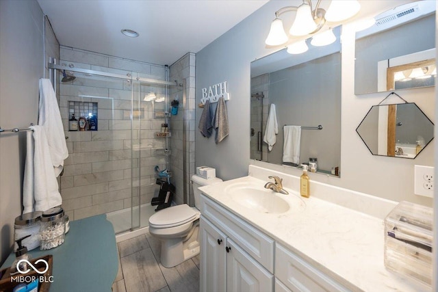 19702 Tomlinson Rd, Westfield, IN 46074 - full bath with visible vents, toilet, a stall shower, and vanity