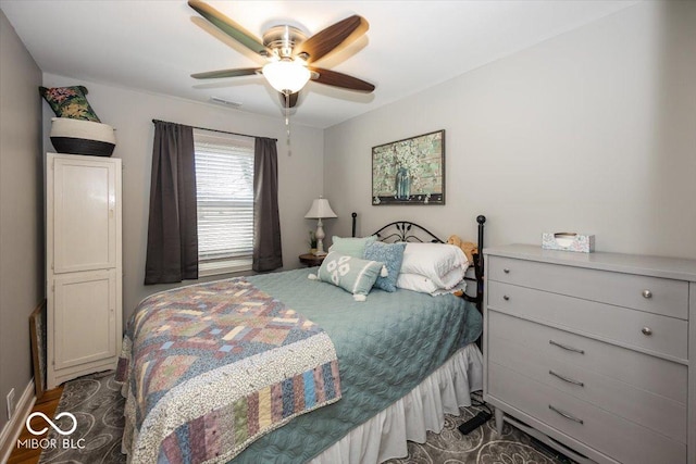 19702 Tomlinson Rd, Westfield, IN 46074 - bedroom with dark wood-style floors, visible vents, and ceiling fan
