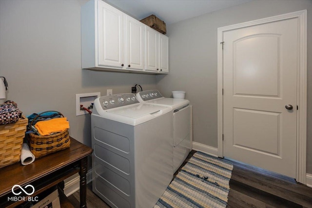 19702 Tomlinson Rd, Westfield, IN 46074 - clothes washing area with washer and dryer, dark wood-type flooring, baseboards, and cabinet space