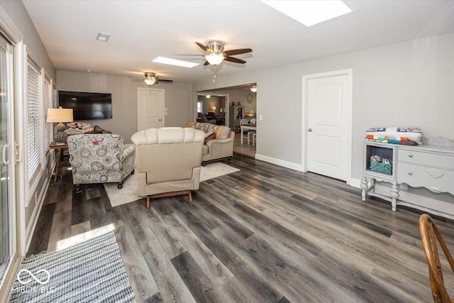 19702 Tomlinson Rd, Westfield, IN 46074 - living area with visible vents, baseboards, a ceiling fan, wood finished floors, and a skylight