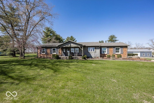 19702 Tomlinson Rd, Westfield, IN 46074 - ranch-style house with brick siding and a front lawn