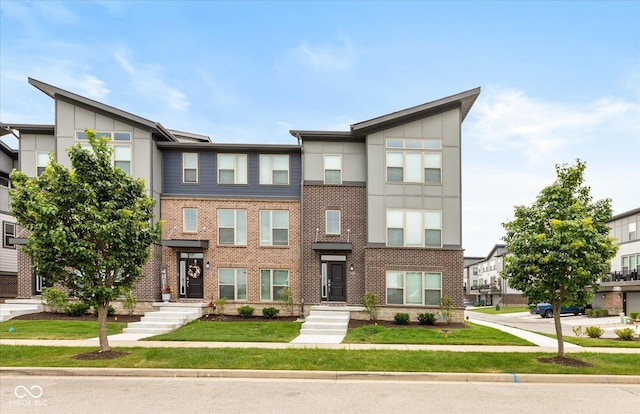 13423 E 134th St, Fishers, IN 46037 - view of property with brick siding and a front yard