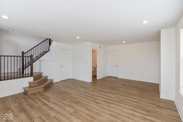 13423 E 134th St, Fishers, IN 46037 - unfurnished living room featuring light wood finished floors, stairs, and recessed lighting