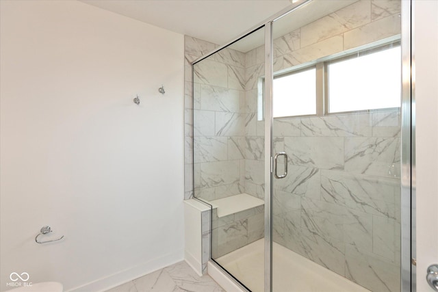 13423 E 134th St, Fishers, IN 46037 - bathroom featuring marble look tile flooring and a stall shower