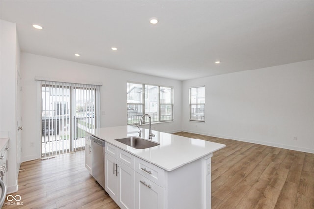 13423 E 134th St, Fishers, IN 46037 - kitchen featuring stainless steel dishwasher, plenty of natural light, light countertops, light wood-style flooring, and recessed lighting