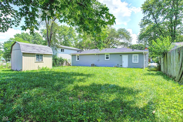 6189 Vigo Dr, Clayton, IN 46118 - back of house featuring a storage unit