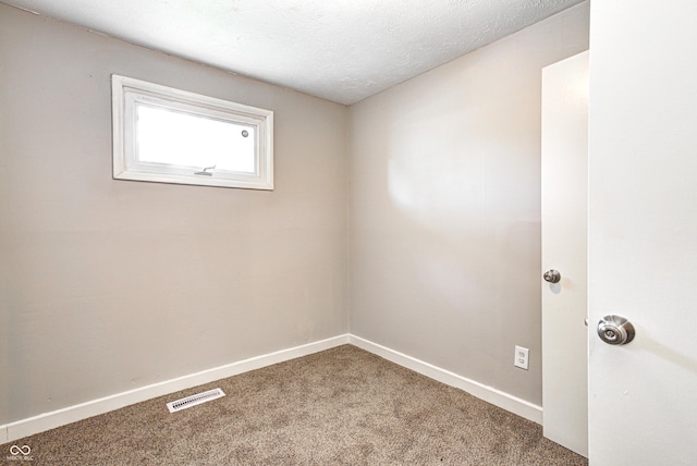 6189 Vigo Dr, Clayton, IN 46118 - carpeted spare room with baseboards and a textured ceiling