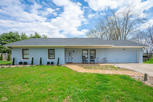 ranch-style house with a front yard, a shingled roof, an attached garage, covered porch, and concrete driveway
