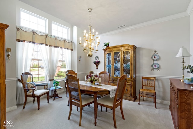 dining room with baseboards, light carpet, visible vents, and an inviting chandelier