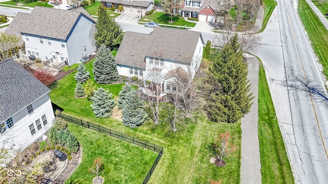 birds eye view of property with a residential view