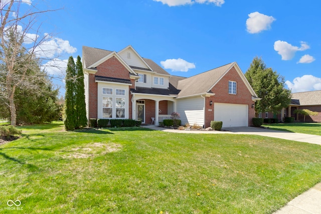 view of front of property with a porch, brick siding, a front yard, and concrete driveway