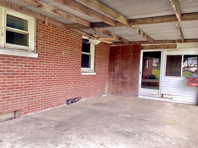 view of patio with ceiling fan