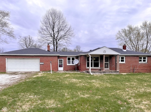 ranch-style house with brick siding, driveway, and a chimney